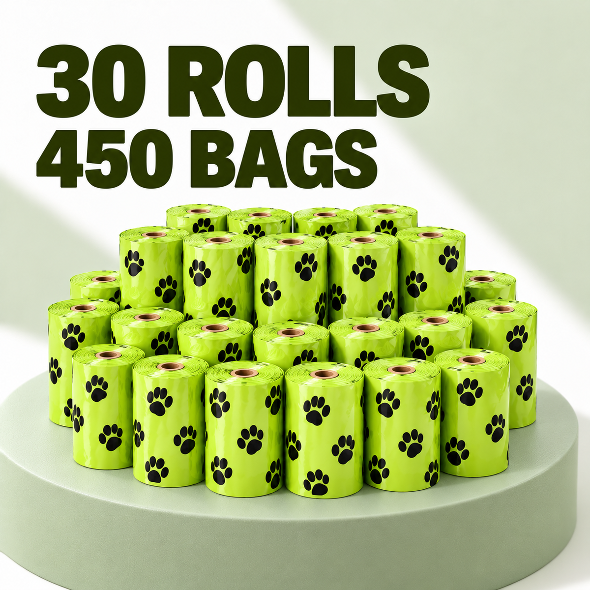 A group of bright lime green plastic bag rolls printed with black paw prints, arranged on a round pedestal. Large dark green text at the top reads '30 ROLLS 450 BAGS'.