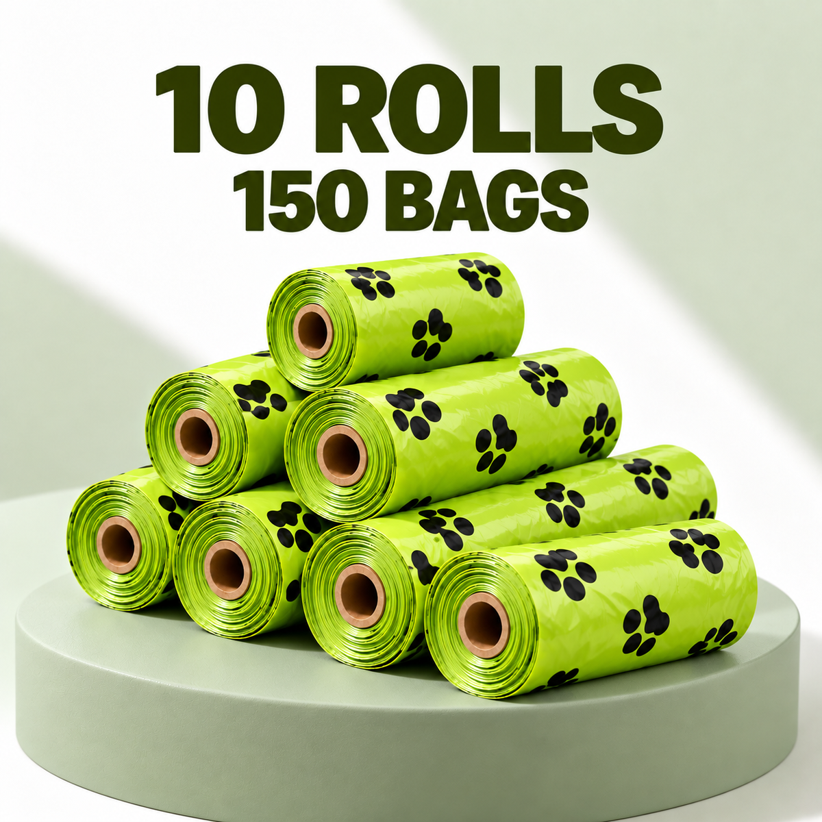 Ten rolls of green pet waste bags with black paw print patterns stacked on a round pedestal, with text reading '10 ROLLS 150 BAGS' above.