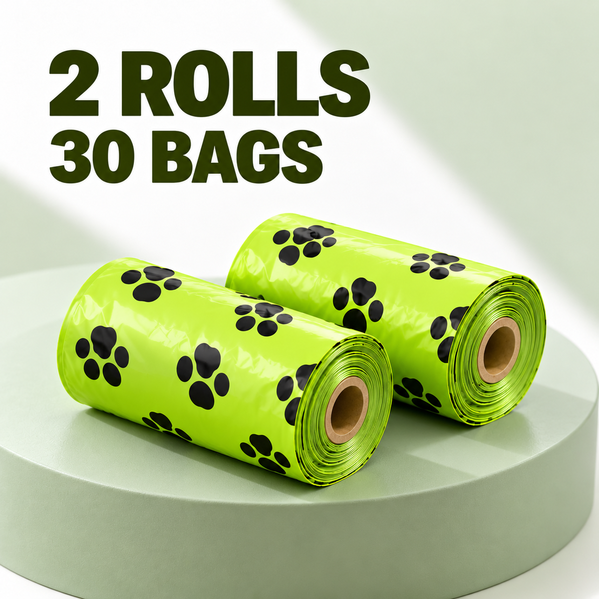 Two rolls of bright lime green pet waste bags with black paw print patterns, displayed on a light green pedestal with text overlay reading '2 ROLLS 30 BAGS'.